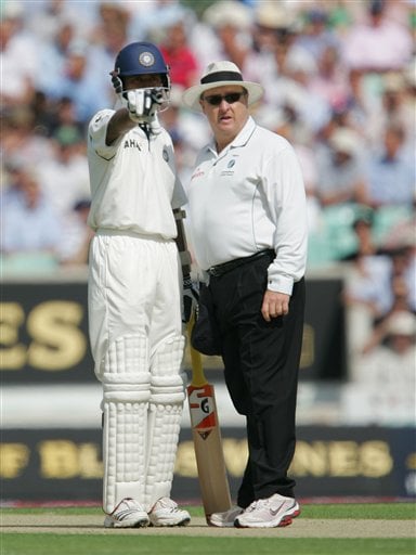 India's Wasim Jaffer talks to umpire Ian Howell about the sight screen position as they play England during the third cricket test at the Oval cricket ground in London on Thursday. India vs England, 3rd Test - Day 1