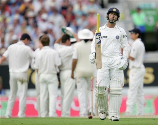 India's Dinesh Kathik tosses his bat in the air walks off the pitch after being given out caught behind off the bowling of England's Ryan Sidebottom, during the first days play at the third cricket test at the Oval in London on Thursday. India vs England, 3rd Test - Day 1