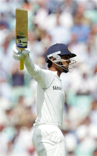 India's Dinesh Karthik celebrates getting 50 runs against England during the first days play at the third cricket test at the Oval in London on Thursday. India vs England, 3rd Test - Day 1