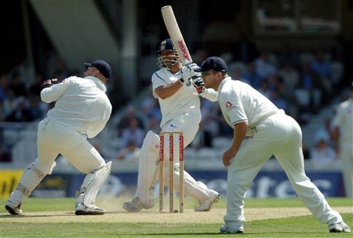 India's Sachin Tendulkar, center, hooks the ball for 4 runs as England's Matt Prior, left, and Paul Collingwood look on during the second day of the third cricket test match at The Oval, in London on Friday. India vs England, 3rd Test - Day 2