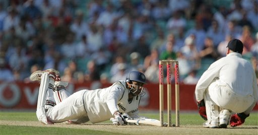 India's Anil Kumble falls in making the runs that take him to his maiden test century against England the second days play of the third cricket test at the Oval cricket ground in London on Friday. India vs England, 3rd Test - Day 2
