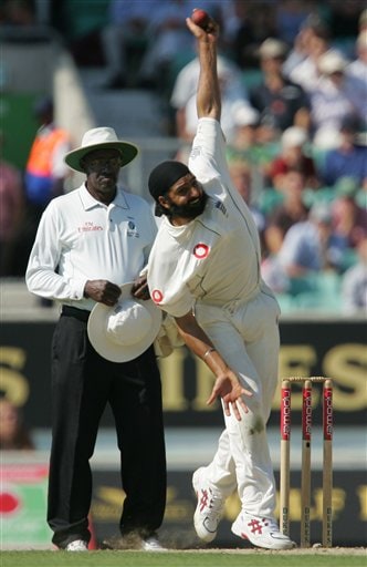 England's Monty Panesar bowls as umpire Steve Bucknor looks on the second day of the third cricket test at the Oval cricket ground in London on Friday. India vs England, 3rd Test - Day 2