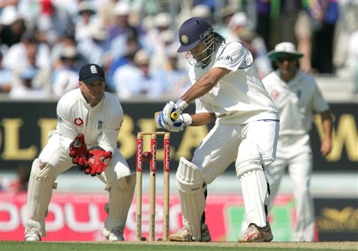 India's Mahendra Singh Dhoni prepares to play a shot off England's Monty Pansear on the second day of the third cricket test at the Oval cricket ground in London on Friday. India vs England, 3rd Test - Day 2