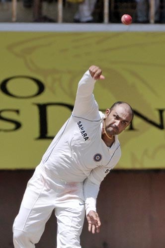 Virender Sehwag bowls during the second day of the first Test match of the Future Cup series in Chennai on Thursday, March 27, 2008. Day 2: India vs SA, 1st Test