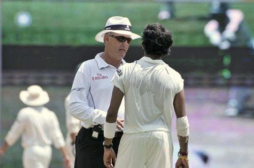 Umpire Tony Hill, left, talks with S. Sreesanth after the latter got involved in an altercation with South Africa's A.B. de Villiers during the second day of the first Test match of the Future Cup series in Chennai on Thursday, March 27, 2008. Day 2: India vs SA, 1st Test