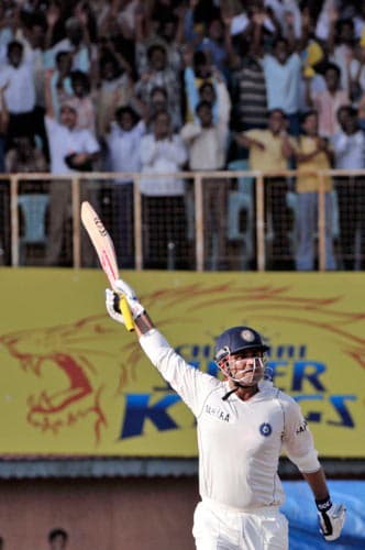 India's cricket enthusiasts give standing ovation, as Virender Sehwag acknowledges after scoring a triple century against South Africa during third day of the first Test match of the Future Cup series in Chennai on Friday, March 28, 2008. South Africa scored 540 in first innings against India. Day 3: India vs SA, 1st Test