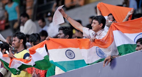 Indian cricket enthusiasts celebrate a double century scored by Virender Sehwag during the third day of the first Test match of the Future Cup series in Chennai on Friday, March 28, 2008. South Africa scored 540 in the first innings against India. Day 3: India vs SA, 1st Test