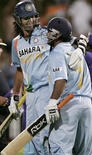 But MS Dhoni on the other hand, carried on strongly. With three to get from the final over, he hit the winning runs through cover. Here, he celebrates with Ishant Sharma after the win. 8th match - India vs Sri Lanka