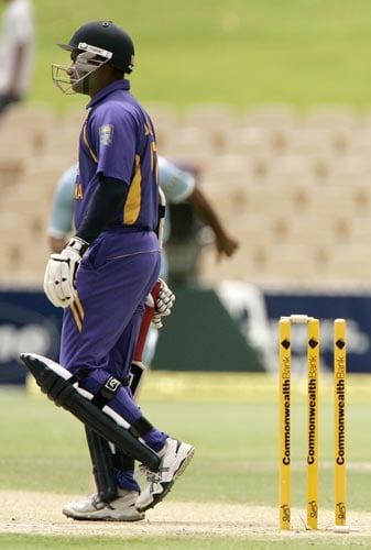 Sanath Jayasuriya is disappointed after being run out in an unfortunate manner, with the ball deflecting off Munaf Patel’s hands on to the stumps. 8th match - India vs Sri Lanka