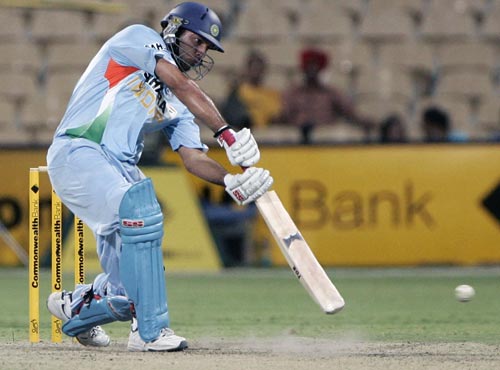With three wickets gone, Yuvraj Singh starts India’s rearguard action, pulling and driving to good effect. Here, he cover drives one to the boundary. 8th match - India vs Sri Lanka
