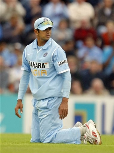 India's captain Rahul Dravid lingers on his knees after trying to field the ball during the one-day cricket match between England and India at The Rose Bowl cricket ground in Southampton, England, Tuesday, Aug. 21, 2007. Ind v Eng, 1st ODI