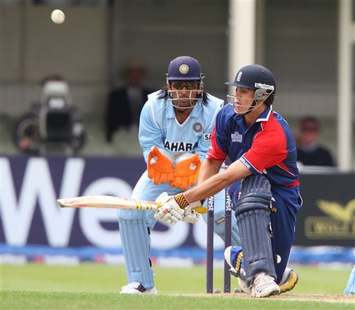 England's Alastair Cook tries to sweep a ball from India's Ramesh Powar but is caught out by Yuvraj Singh during their one day international cricket match at Edgbaston, Birmingham on Monday. India vs England - 3rd ODI