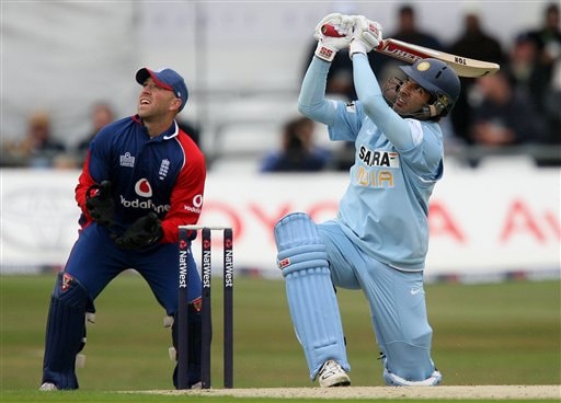 Yuvraj Singh, right, hits the ball for six to bring up his fifty against England during the fifth one day International match Headingley Cricket ground in Leeds, England, Sunday Sept. 2, 2007. India v England - 5th ODI