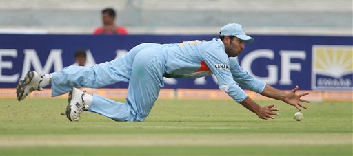 Yuvraj Singh dives to stop a shot while fielding against Australia during the third one day international cricket match in Hyderabad, India Friday Oct. 5, 2007. Ind v Aus - 3rd ODI