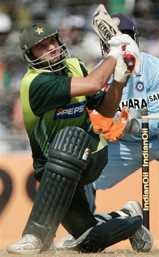Pakistan's Shahid Afridi, plays a shot against India during their first one day international cricket match in Gauhati, India, Monday, Nov. 5, 2007. Ind v Pak - 1st ODI