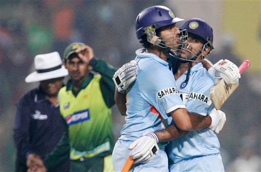 Yuvraj Singh, right and Mahendra Singh Dhoni, second from right, celebrate after India beat Pakistan by 6 wickets in the fourth one-day international match in Gwalior on Thursday, Nov. 15, 2007. Ind vs Pak - 4th ODI