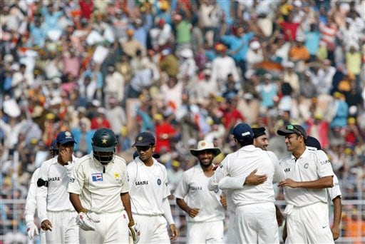 Indian cricketers celebrate the dismissal of Pakistan's Mohammad Yousuf, second left, during the third day of the second Test match in Kolkata on Sunday, December 2, 2007. 2nd Test, Ind vs Pak - Day 3
