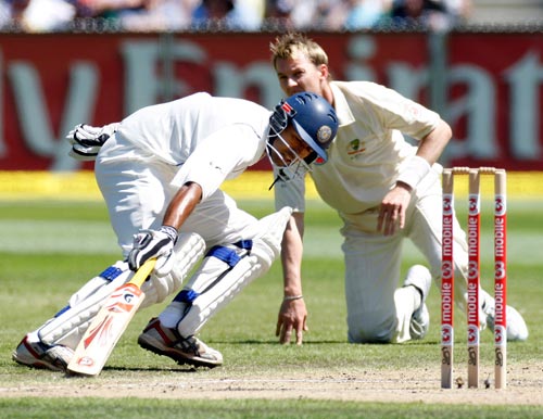 Wasim Jaffer, left, and Australia's Brett Lee in action during the second day of their first Test match at the Melbourne Cricket Ground in Melbourne on Thursday, December 27, 2007. 1st Test, Ind vs Aus - Day 2