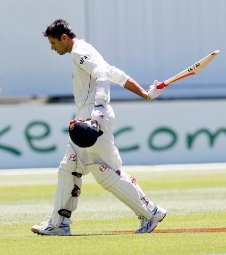 Rahul Dravid leaves the field after being dismissed LBW to Andrew Symonds during the fourth day of their first Test match at the Melbourne Cricket Ground on Saturday, December 29, 2007. 1st Test, Ind vs Aus - Day 4
