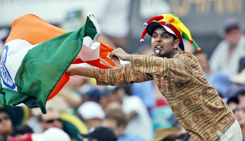 An Indian supporter waves a national flag on day two of the second cricket Test against Australia in Sydney on Thursday, January 3, 2008. 2nd Test, Ind vs Aus - Day 2