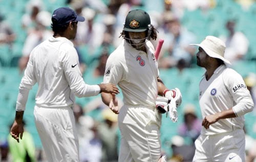 Sachin Tendulkar, right, and Rudra Singh, left, congratulate Andrew Symonds, center, at the end of Australia's first innings at the Sydney Cricket Ground on Thursday, January 3, 2008, on the second day of their second cricket Test. Symonds was 162 not out. 2nd Test, Ind vs Aus - Day 2