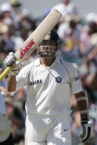 Sachin Tendulkar raises his bat after making 50 runs against Australia at the WACA in Perth on Wednesday, January 16, 2008, on the first day of their third Test match. Australia lead the series 2-0. 3rd Test, Ind vs Aus - Day 1