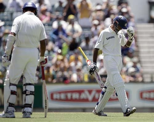 Wasim Jaffer, right, walks off after he was caught behind for 16 runs against Australia at the WACA in Perth on Wednesday, January 16, 2008, on the first day of their third Test match. Australia lead the series 2-0. 3rd Test, Ind vs Aus - Day 1
