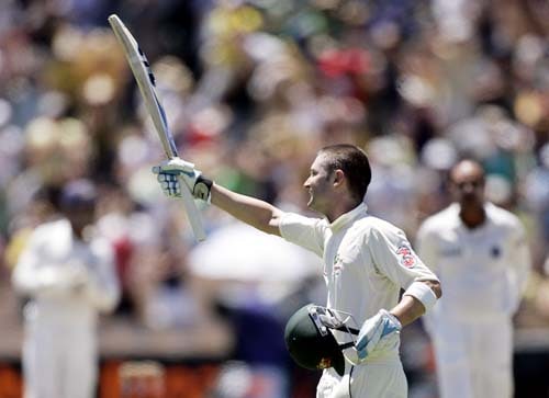 Michael Clarke raises his bat after making 100 runs against India at the Adelaide Oval on Sunday, January 27, 2008, on the fourth day of their fourth Test. India made a first innings total of 526. 4th Test, Ind vs Aus - Day 4