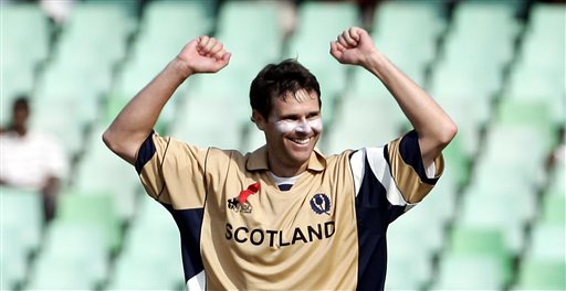 Scotland's Craig Wright celebrates the dismissal of Pakistan's Shahid Afridi during their Twenty20 World Championship cricket match in Durban, South Africa, Wednesday Sept. 12, 2007. Pakistan vs Scotland