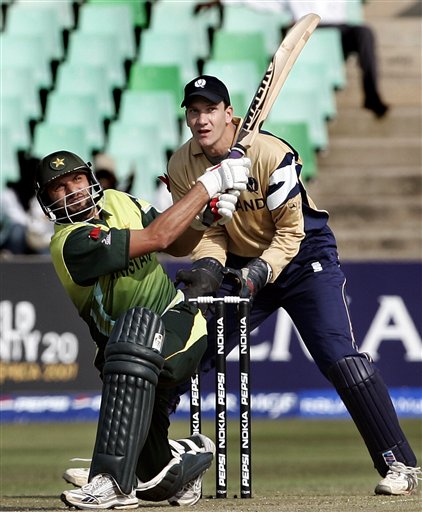 Pakistan's Shahid Afridi, left, plays a shot against Scotland during their Twenty20 World Championship cricket match in Durban, South Africa, Wednesday Sept. 12, 2007. Pakistan vs Scotland