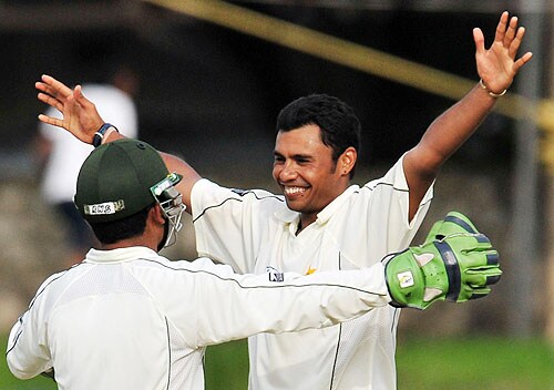 Danish Kaneria celebrates with Kamran Akmal after dismissing Tillakaratne Dilshan on the second day of the third and final Test at The Sinhalese Sports Club in Colombo. (AFP Photo) Pak vs SL: 3rd Test, Day 2