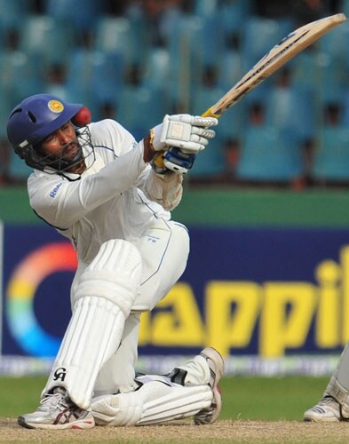 Tillakaratne Dilshan is hit in the face by the ball on the second day of the third and final Test at The Sinhalese Sports Club in Colombo. (AFP Photo) Pak vs SL: 3rd Test, Day 2