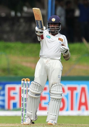 Mahela Jayawardene raises his bat to the crowd after scoring a half-century on the second day of the third and final Test at The Sinhalese Sports Club in Colombo. (AFP Photo) Pak vs SL: 3rd Test, Day 2