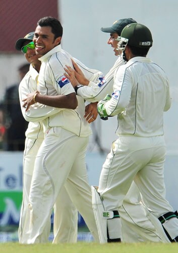 Danish Kaneria is congratulated by his teammates after dismissing unseen Mahela Jayawardene on the second day of the third and final Test at The Sinhalese Sports Club in Colombo. (AFP Photo) Pak vs SL: 3rd Test, Day 2