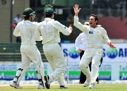 Saeed Ajmal celebrates with teammates the dismissal of Thilan Samaraweera on the second day of the third and final Test between Sri Lanka and Pakistan at The Sinhalese Sports Club in Colombo. (AFP Photo) Pak vs SL: 3rd Test, Day 2