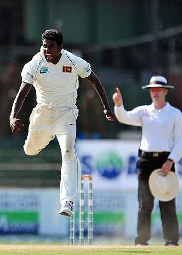 Angelo Mathews celebrates after dismissing of Misbah-ul-Haq during the third day of the third and final Test match between Sri Lanka and Pakistan at The Sinhalese Sports Club in Colombo. (AFP Photo) Pak vs SL: 3rd Test, Day 3