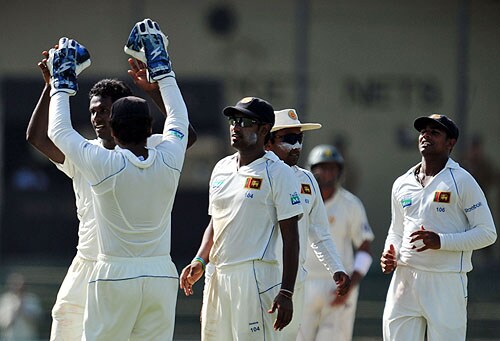 Angelo Mathews and teammates celebrate dismissing Misbah-ul-Haq during the third and final Test match between Sri Lanka and Pakistan at The Sinhalese Sports Club in Colombo. (AFP Photo) Pak vs SL: 3rd Test, Day 3