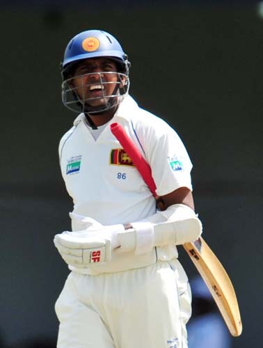 Thilan Samaraweera walks back to the pavilion following his dismissal during the second day of the second Test match between Pakistan and Sri Lanka at The P. Saravanamuttu Stadium in Colombo. (AFP Photo) Day 2: Pak vs SL, 2nd Test