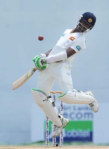 Nuwan Kulasekara avoids a bouncer during the second day of the second Test match between Pakistan and Sri Lanka at the P. Saravanamuttu Stadium in Colombo. (AFP Photo) Day 2: Pak vs SL, 2nd Test