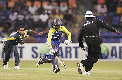 Upul Tharanga completes a run as Rana Naved ul Hassan throws the ball during their fourth One-Day International in Colombo. (AP Photo) Pak vs SL: 4th ODI
