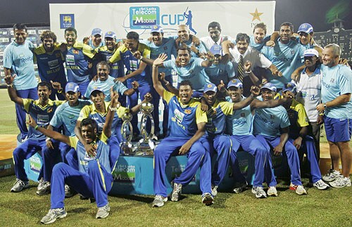 Sri Lankan cricket team poses for photographs after winning the five-match series 3-2 during their final One-Day International match between Sri Lanka and Pakistan in Colombo on August 9, 2009. (AP Photo) Pak vs SL: 5th ODI