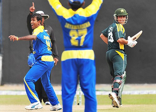 Nuwan Kulasekara celebrates after dismissing Kamran Akmal during the fifth and final One-Day International match between Sri Lanka and Pakistan at The R Premadasa Stadium in Colombo. (AFP Photo) Pak vs SL: 5th ODI