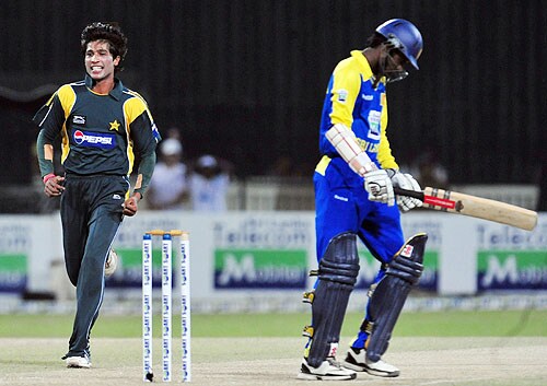 Mohammad Aamer celebrates after the dismissal of Upul Tharanga during the fifth and final One-Day International match between Sri Lanka and Pakistan at The R Premadasa Stadium in Colombo. (AFP Photo) Pak vs SL: 5th ODI
