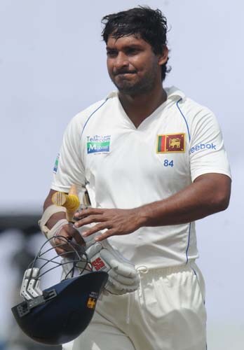 Kumar Sangakkara walks back to the pavilion after his dismissal during the first day of the first Test match between and Sri Lanka at The Galle International Stadium in Galle on July 4, 2009. (AFP Photo) Day 1: Pak vs SL, 1st Test