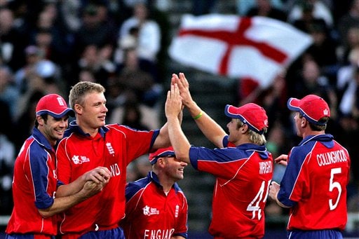 England's Andrew Flintoff, 2nd left, celebrates with his teammates after dismissing South Africa's AB. De Villiers, not seen, during World Twenty 20 cricket Championships at Newlands in Cape Town, South Africa, Sunday, Sept. 16, 2007. South Africa vs England