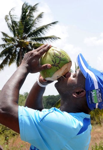 Sanath Jayasuriya drinks a king coconut during a practice session at the Rangiri Dambulla International stadium in Dambulla, Colombo on July 29, 2009. Sri Lanka are set to play five ODIs and a Twenty20 International series against the visiting Pakistan team. (AFP Photo) Lanka in nets at Dambulla