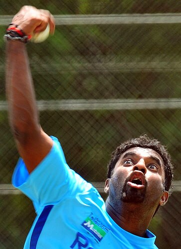 Muttiah Muralitharan delivers a ball during a practice session at The Rangiri Dambulla International stadium in Dambulla. (AFP Photo) Lanka in nets at Dambulla