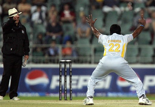 Sri Lanka's bowler Chaminda Vaas, right, appeals successfully for LBW to umpire Mark Benson of England, left, to dismiss Bangladesh's batsman Nazimuddin, unseen, during their Super Eight Twenty20 World Championship cricket match at the Wanderers Stadium in Johannesburg, South Africa, Tuesday, Sept. 18, 2007. Sri Lanka vs Bangladesh