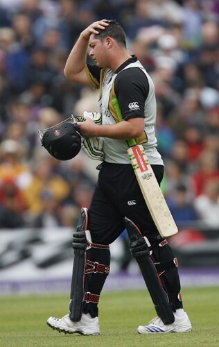 New Zealand's Jesse Ryder walks off after being caught by Scotland's Calum MacLeod during their ICC World Twenty20 match against Scotland at The Oval in London. (AFP Photo) WT20: NZ vs SCO