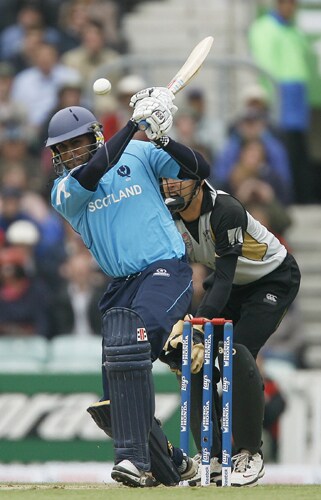 Navdeep Poonia of Scotland hits the ball during their ICC World Twenty20 match against New Zealand at The Oval in London. (AFP Photo) WT20: NZ vs SCO